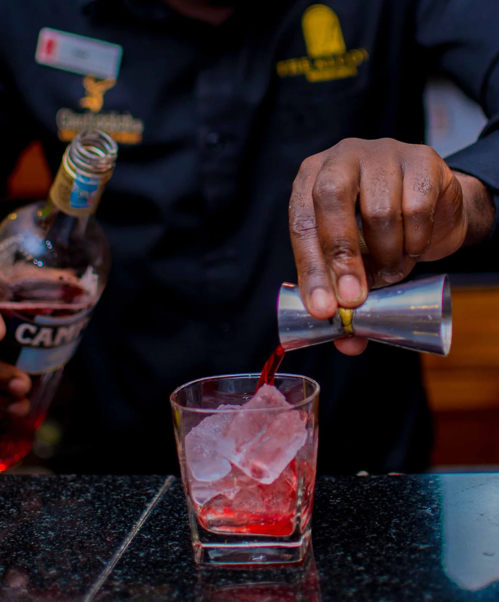Alcove bartender mixing a cocktail