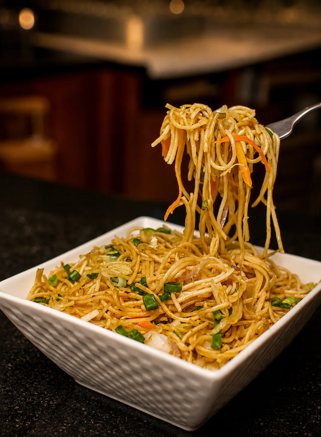 Stir-fried Hakka noodles served at The Alcove